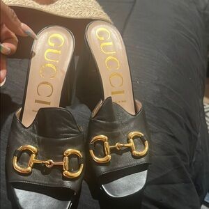Gucci Black and Gold Mules with Signature Horsebit